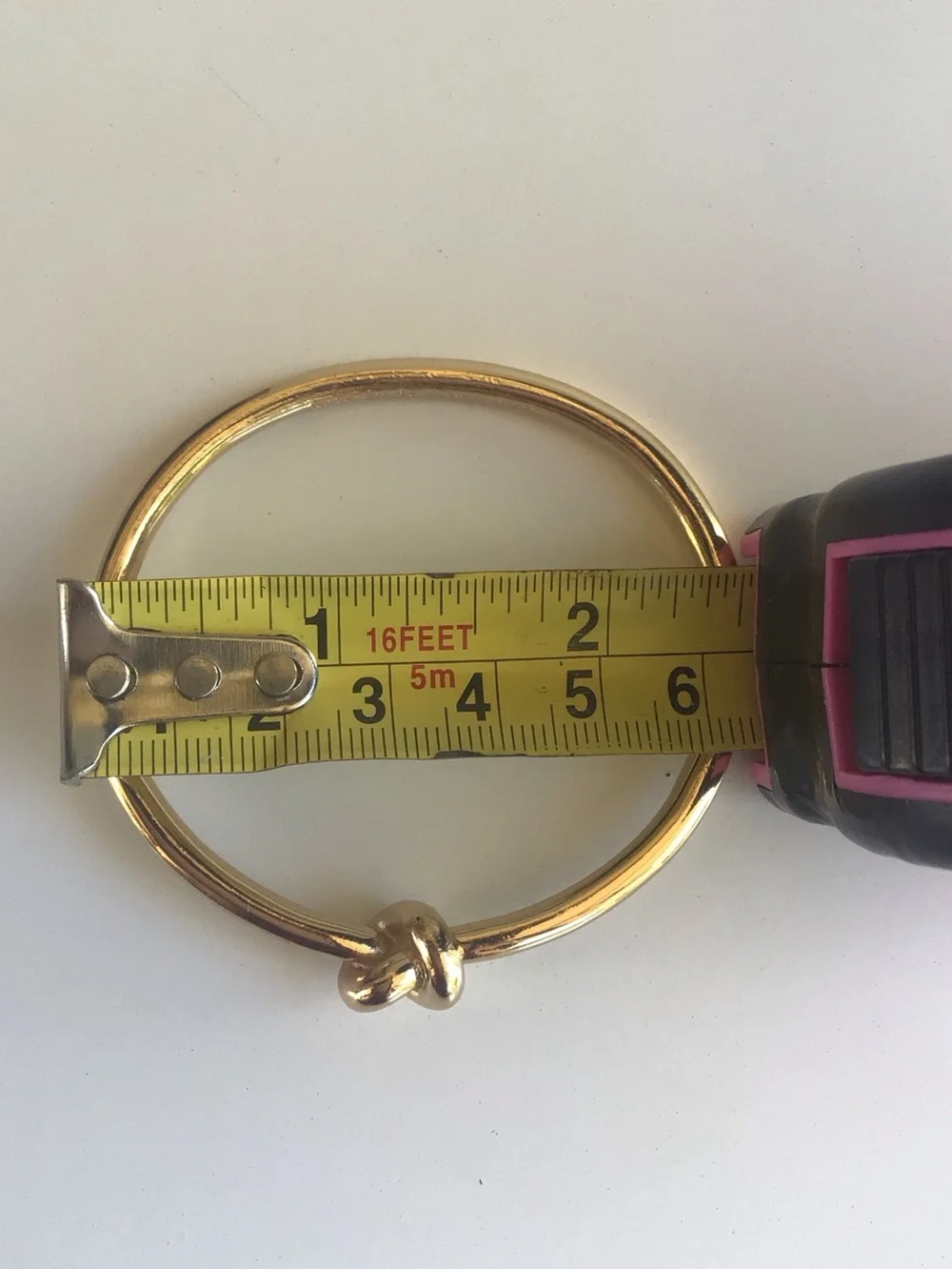 Kate Spade gold knot bangle bracelet